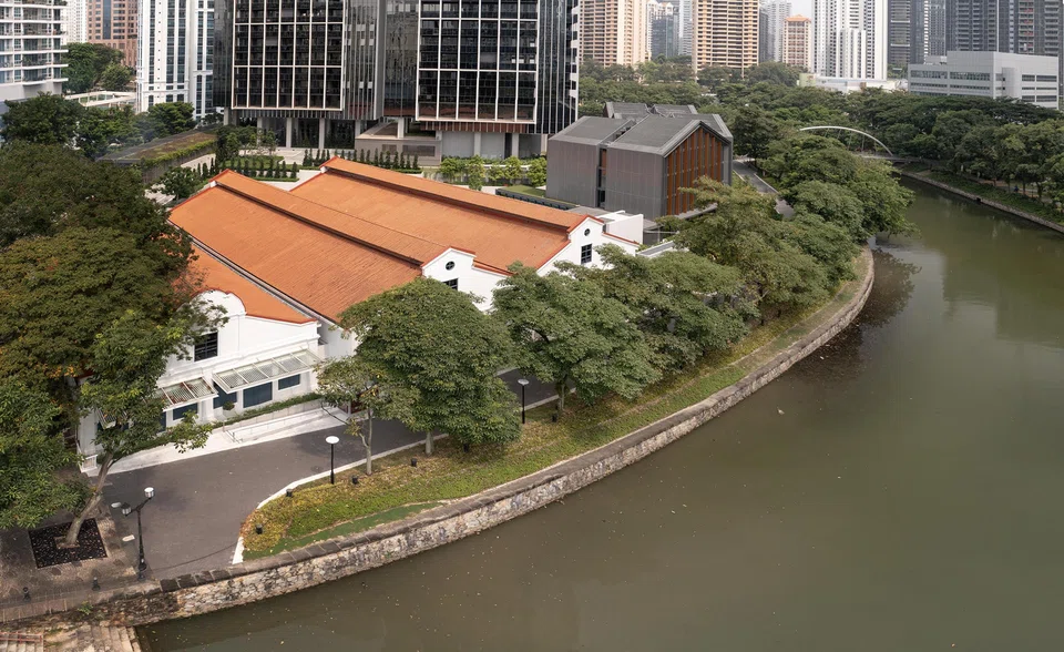 The three warehouses, formerly home to nightspot Zouk, have been conserved. Fraser Residence River Promenade is to the right of the godowns.