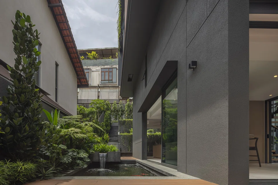 A koi pond in the side garden.