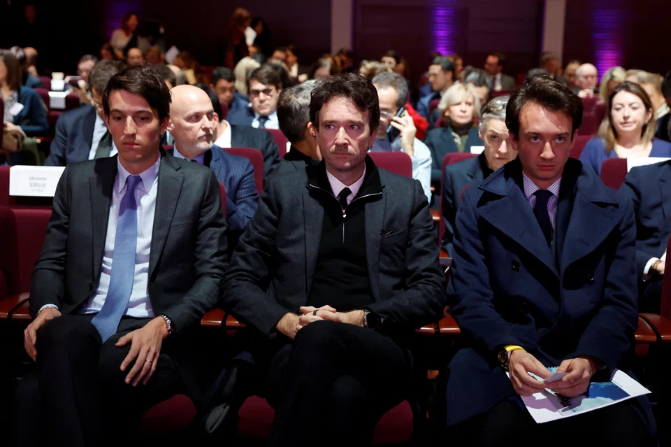 Alexandre Arnault, Antoine Arnault, and Frederic Arnault, at LVMH's news conference to present its 2022 results in Paris on Jan 26, 2023. 