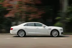 Though nearly impossible to tell from the outside,  the Bentley Flying Spur Hybrid is a plug-in hybrid electric vehicle.