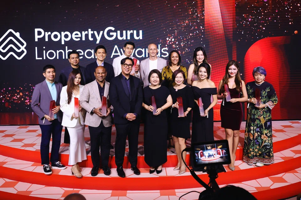 PropertyGuru Group chief executive officer Lewis Ng (front row, fourth from left) with Lionheart Awards winners recognised for service excellence.