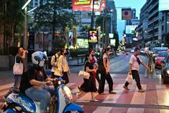 Thailand's lower-income families are turning to illegal loan sharks, as the country's banks tighten credit.