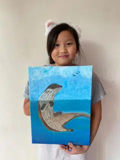 Art piece "Behind a Glass" by Charlotte Chin is about how animals can be caught and put into display. 