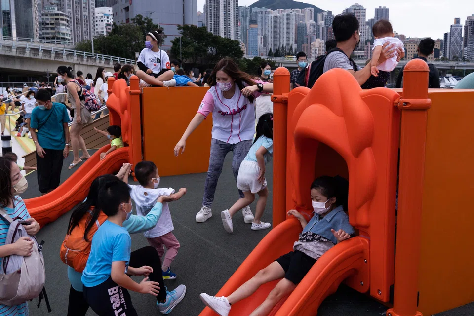 Children at the new East Coast Park Precinct in Hong Kong.  Hong Kong currently allows children as young as 3 years old to get Sinovac shots; those aged five and up can get the vaccine developed by BioNTech and its partner, Pfizer.