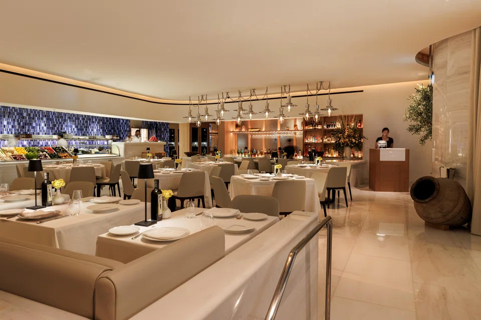 Estiatorio Milos features plenty of marble and a market-like display of seafood.