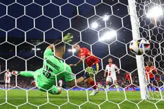 Spain's Fabian Ruiz scores the team's second goal against Georgia in Cologne, Germany, June 30, 2024.