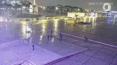 Smoke rises following an explosion, next to the body of a man who threw objects and committed suicide in a blast, outside Brazil's Supreme Court, in Brasilia, Brazil on Wednesday.