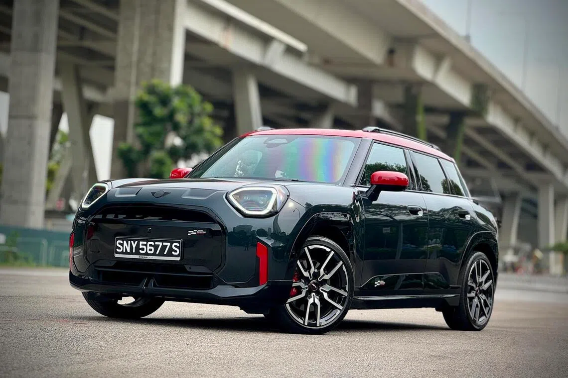 This new Aceman has a chilli red roof, black skirts, a chunky tailgate spoiler and chequered-flag logos.