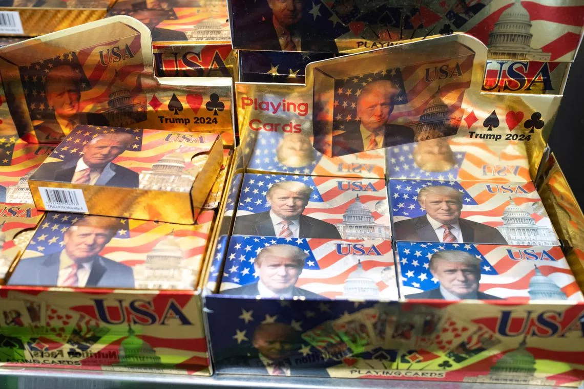 Playing cards depicting U.S. President-elect Donald Trump are displayed for sale at a gas station in West Palm Beach, Florida, U.S., December 8, 2024. REUTERS/Marco Bello