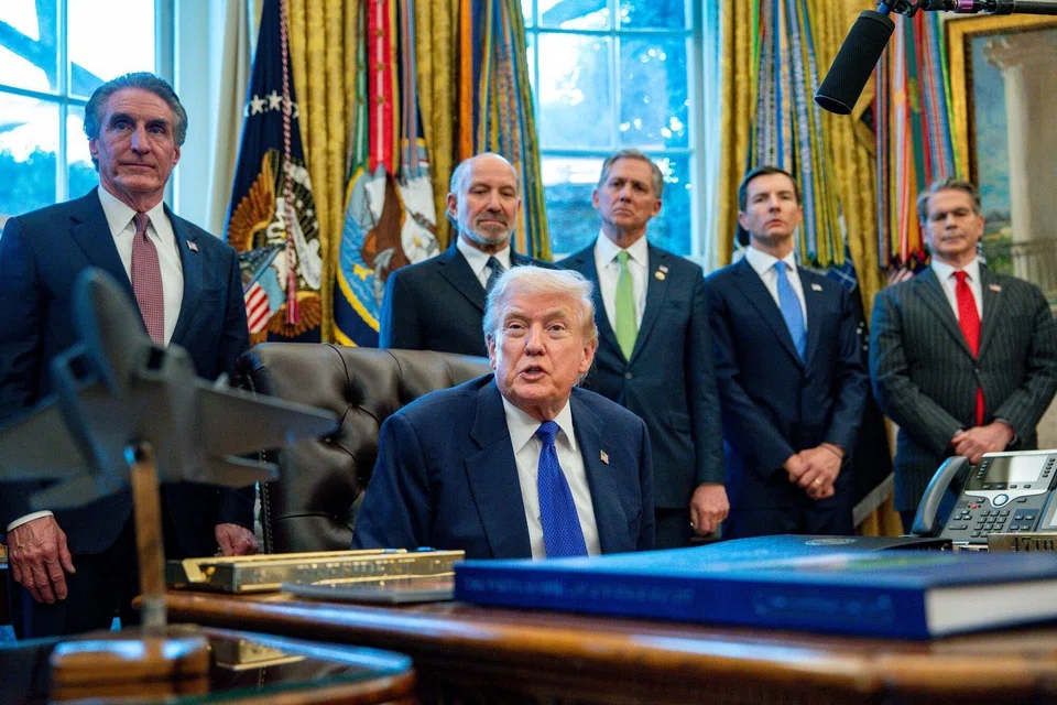 US President Donald Trump (centre) unveiling "Project Vault" at the White House in Washington, DC, on Monday (Feb 2).
The US$12 billion critical minerals stockpile is aimed at minimising reliance on Chinese rare earths.  