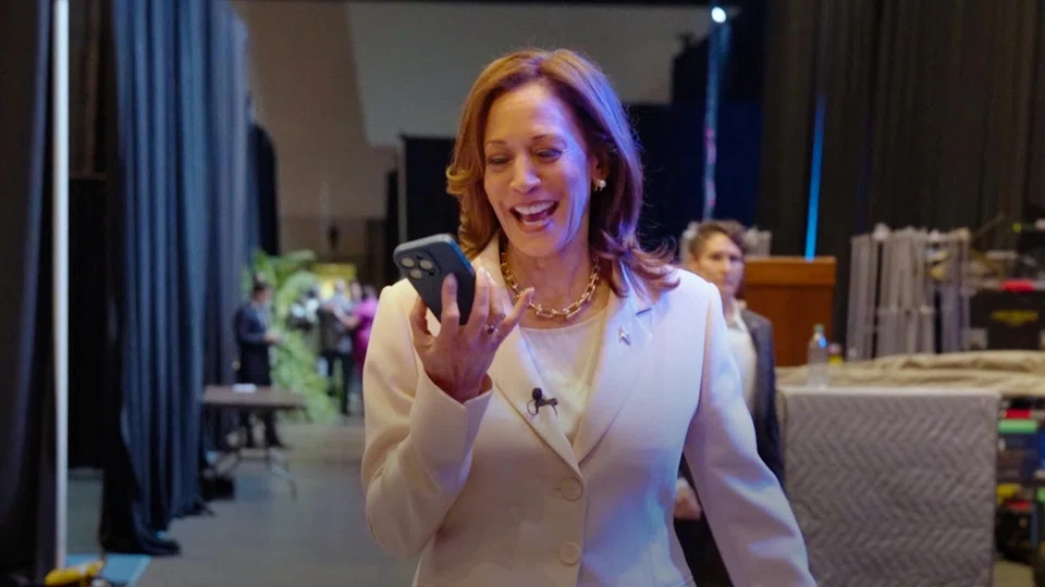 US Vice President Kamala Harris speaks on the phone with former President Barack Obama and former first lady Michelle Obama as the Obamas endorse Harris as the Democratic presidential candidate in this still image taken from a video released on July 26, 2024. 