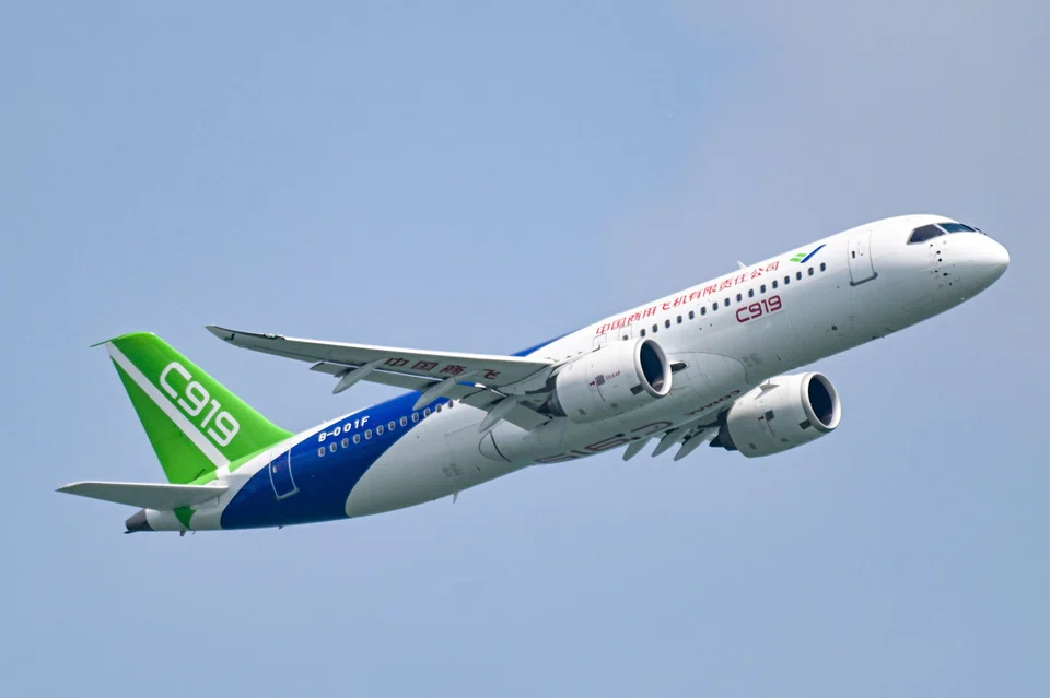 A C919 performs during a preview of the Singapore Airshow in Singapore on Feb 18. 