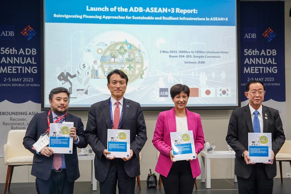 Second Minister for Finance Indranee Rajah (second from right) with Thai Finance Minister Arkhom Termpittayapaisith (right), Philippine Finance Undersecretary Mark Dennis Joven (left) and ADB managing director general Woochong Um (second from left) at the launch of the ADB-Asean+3 report.