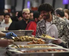 Arsenal midfielder Mohamed Elneny at a celebration of iftar, the evening meal to break the daily Ramadan fast, at the team's stadium in London on Mar 28.