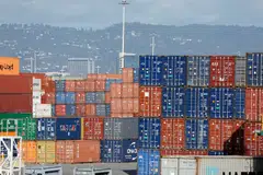 Shipping containers at the Port of Oakland in California. Tariffs raise the prices for the importing country and, over time, shrink trade between the importing and exporting country.