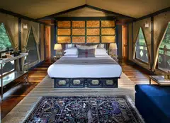 The luxurious tented suites of andBeyond Punakha River Lodge bring guests closer to Bhutan's flora and fauna.