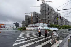 China will carry out “high-quality” urban renewal and limit extremely tall buildings and enhance housing safety.