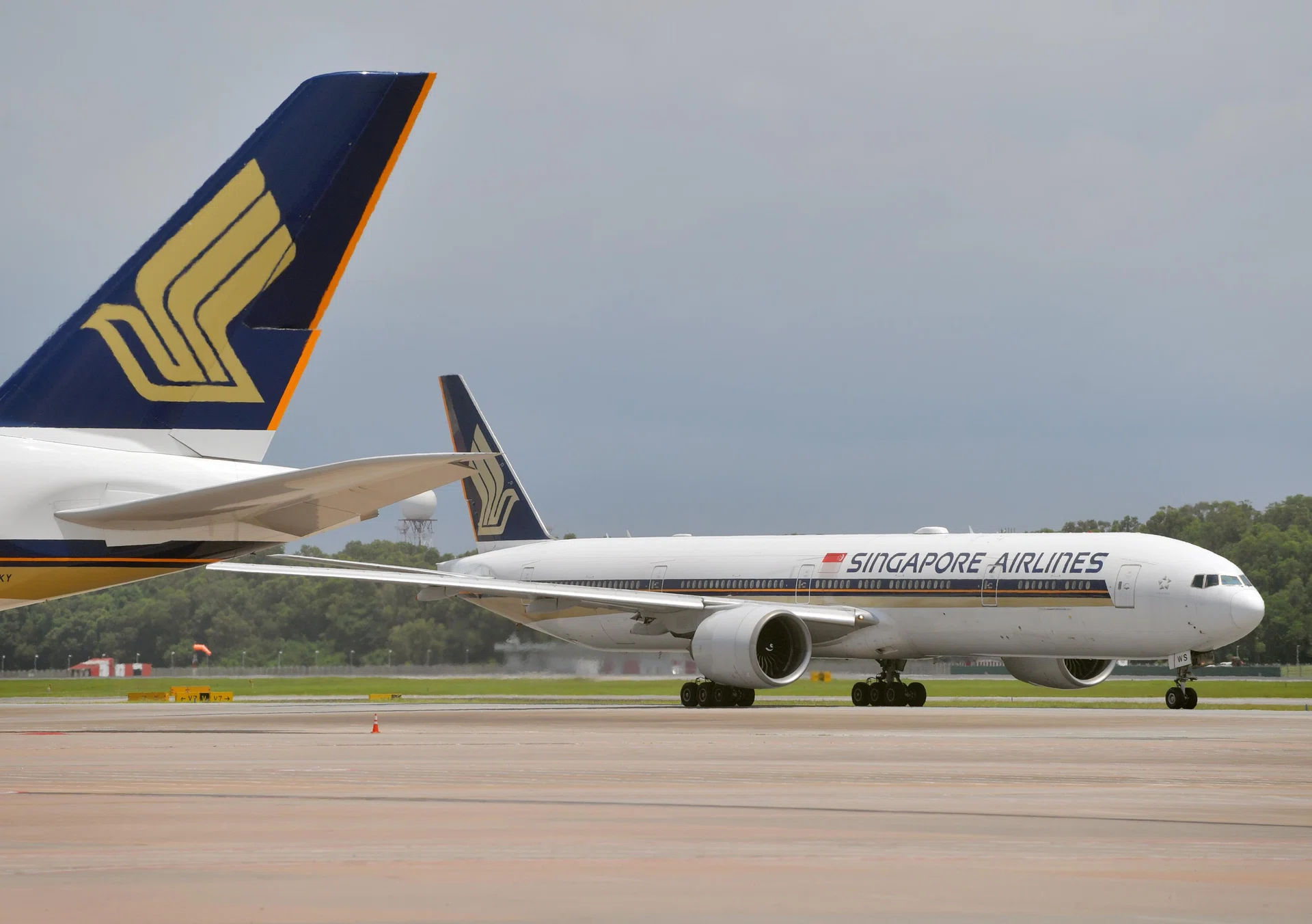 SIA to redeem half its 2021 mandatory convertible bonds with cash reserves  - The Business Times