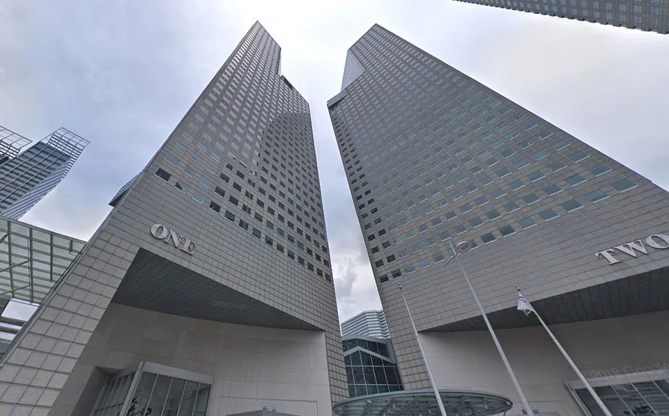 Suntec Tower One (left) stands on a site with a balance lease term of about 65 years and 5 months.