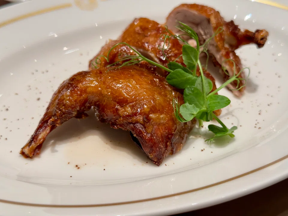 Well-seasoned roasted quail.