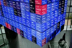 Share prices on display inside the Kabuto One building in Tokyo. The Tokyo Stock Exchange is offering help in fundraising and IPO preparations with partners including banks, auditors and venture capital funds in Asia. 