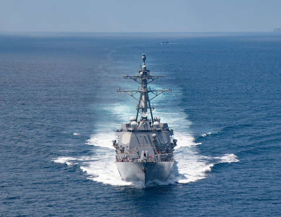 A United States Navy ship on a transit through the Taiwan Strait. In a hypothetical Taiwan Strait crisis, it is possible that out of the Quadrilateral Security Dialogue – Australia, India, Japan, and the United States – the US would be left to act alone.