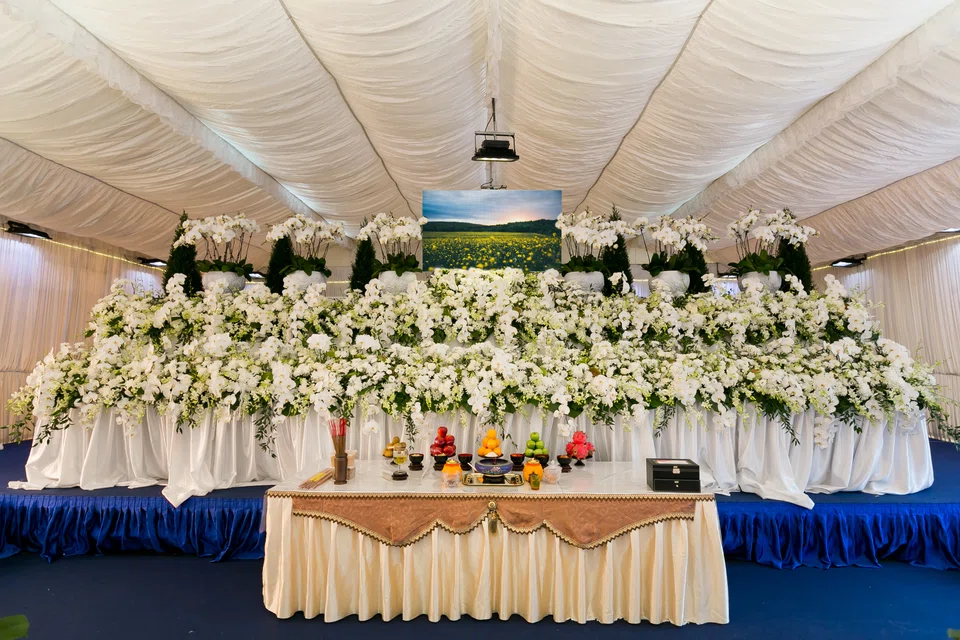 An elaborate funeral setting arranged by Ang Chin Moh Funeral Directors.