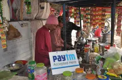 A tea stall in Dehradun that accepts mobile payment. Countries such as India have shown that it is possible to provide residents with a unique digital identifier, mandate the banks to provide low-cost, no-frills accounts, and install a system to facilitate interbank transactions through mobile phones.