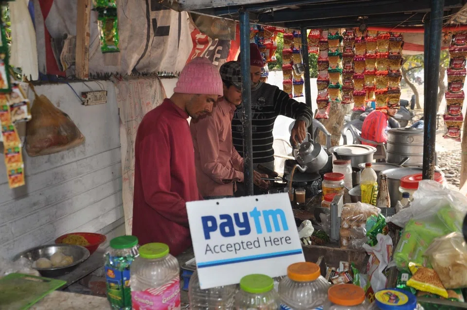 A tea stall in Dehradun that accepts mobile payment. Countries such as India have shown that it is possible to provide residents with a unique digital identifier, mandate the banks to provide low-cost, no-frills accounts, and install a system to facilitate interbank transactions through mobile phones.