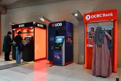 Although the increase in the cap could lead to a “substantial rise” in GXS and MariBank’s deposit holdings, this still dwarfs in comparison to Singapore’s trio of local banks. 