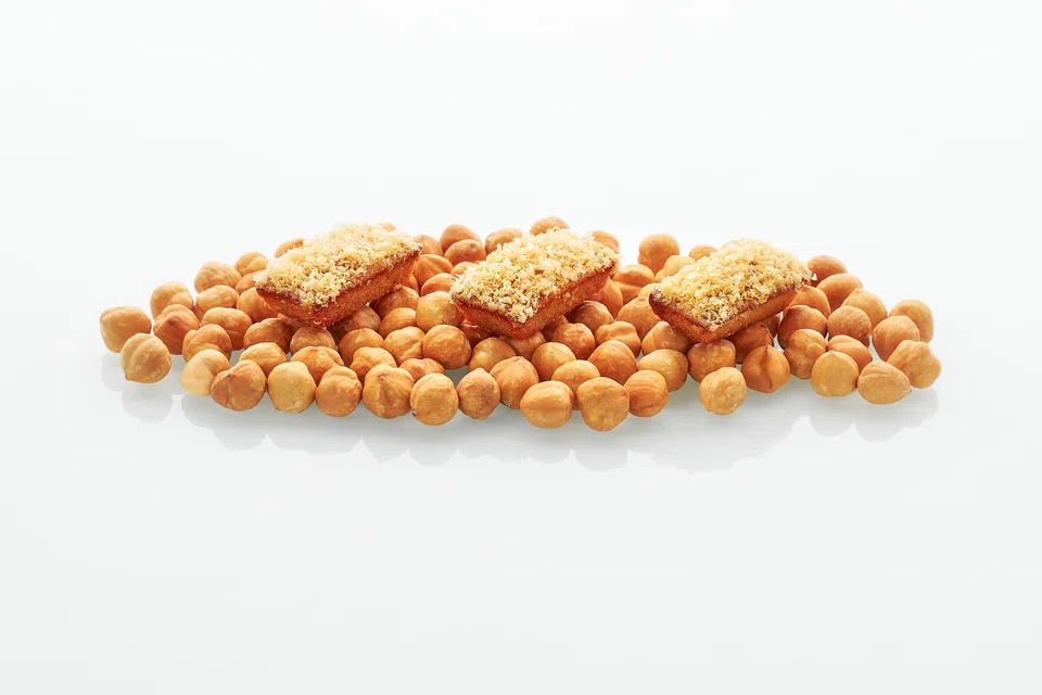 Chewy and fragrant hazelnut financiers kick off the meal.