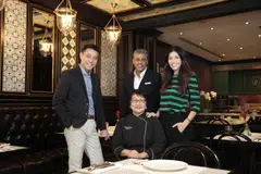 Restaurateur Violet Oon (seated) with (from left) her son Tay Yiming, business partner Manoj Murjani and daughter Tay Su-Lyn, in a photo from 2018, before the dispute arose.