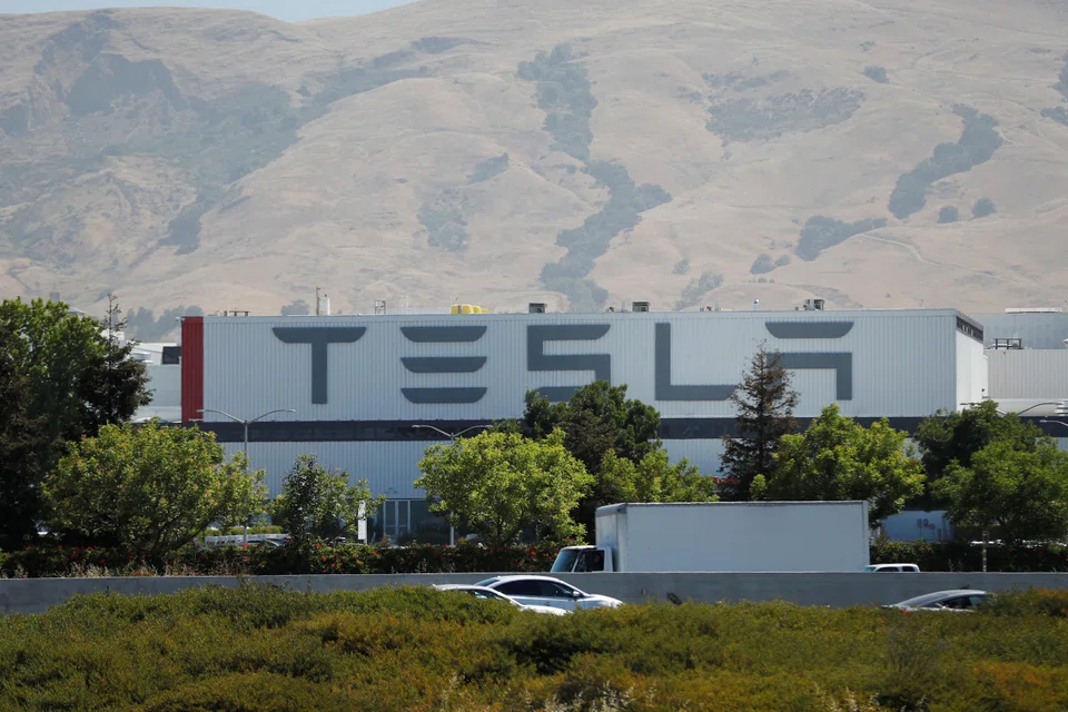 The Tesla factory is seen in Fremont, California, U.S. June 22, 2018.  The electric car manufacturer plans to lay off an additional 601 employees in the state.