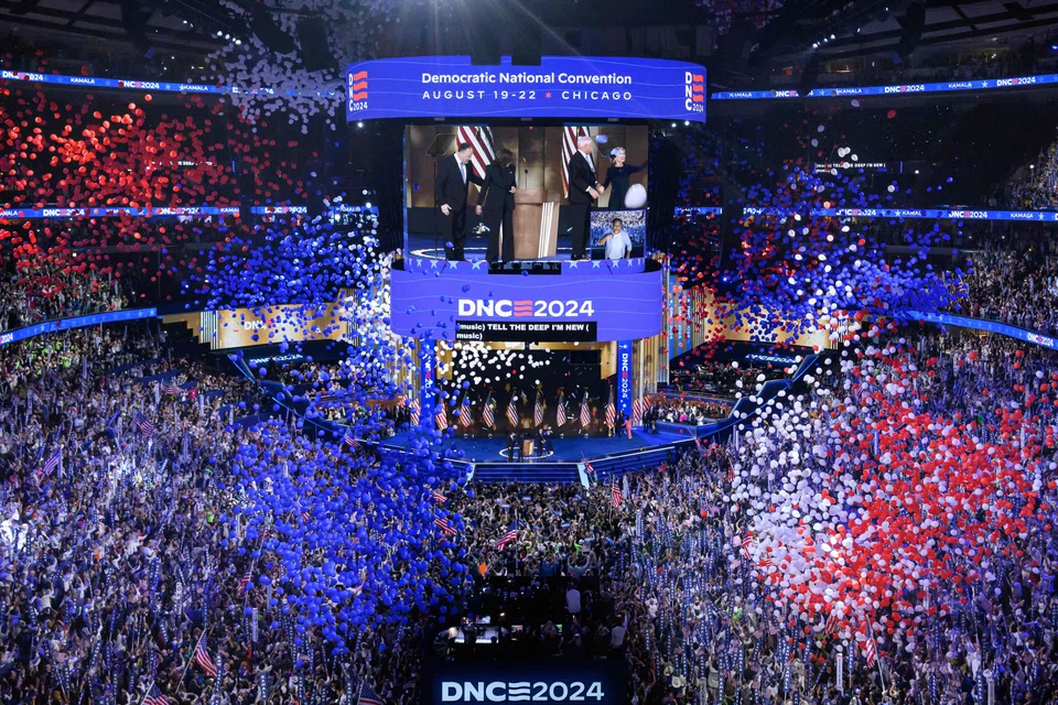 Red, white and blue balloons falling at the end of the Democratic National Convention last month. Patriotic displays will arguably help Harris win over voters who previously voted for Biden but could be tempted to support Trump.