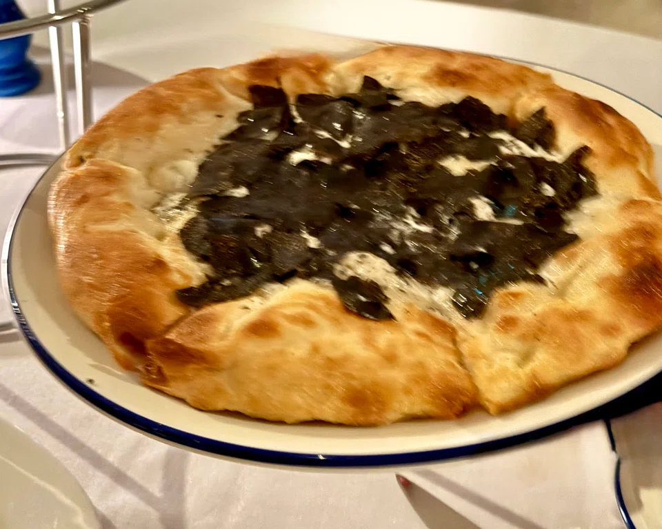 Truffle pinsa features fermented pizza dough.