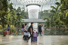 Travellers at Jewel Changi Airport. Crowne Plaza Changi Airport won the awards for World’s Best Airport Hotel and Best Airport Hotel in Asia.