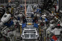 Auto manufacturing at VinFast electric automobile plant in Vietnam. The US and China are expected to redirect economic activities to Asean, including Vietnam.