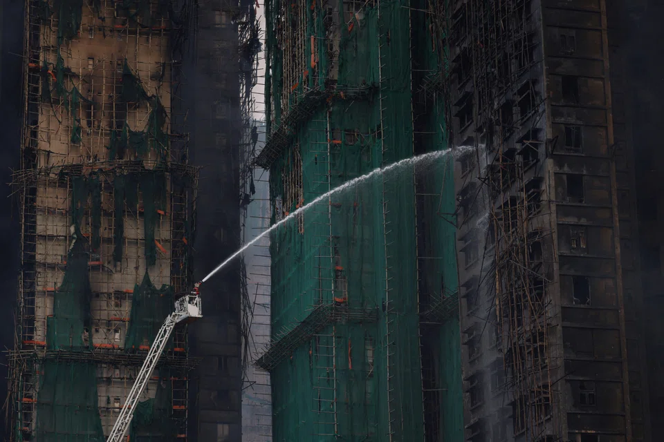 A fire in late November that ripped through seven high-rise towers and killed more than 160 people. 