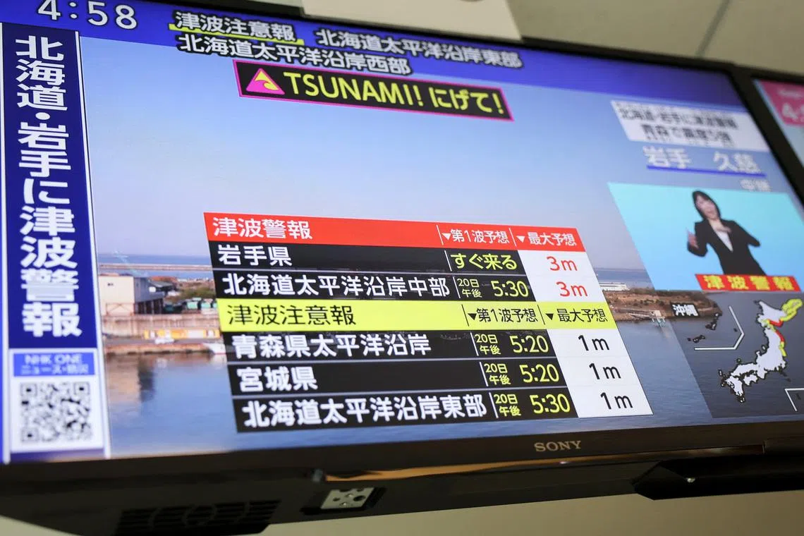 The Japan Meteorological Agency's tsunami warning on a TV news report after an earthquake struck the country on Apr 20. 