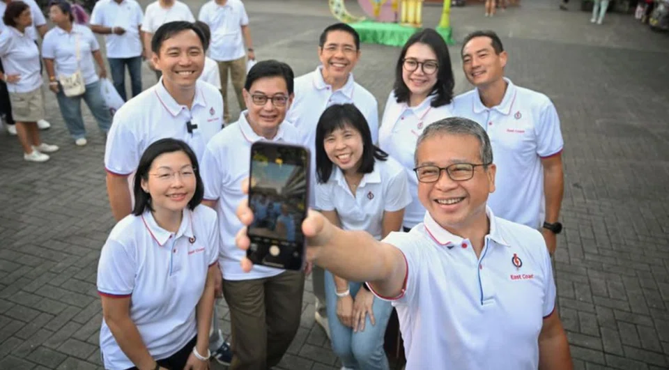 Former brigadier-general Goh Pei Ming (second row; far left) and Madam Hazlina Abdul Halim (second row; second from right), the former chief executive of Make-A-Wish Singapore, joined five East Coast MPs and Joo Chiat MP Edwin Tong on a walkabout on Saturday.