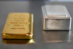 Gold prices edged higher on Friday as lower US Treasury yields outweighed pressure from an elevated dollar, but bullion was still headed for its biggest monthly drop since September on fears of aggressive interest rate hikes by the Federal Reserve. 