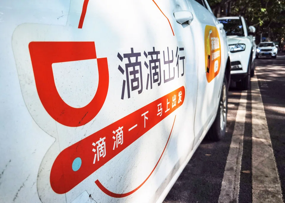 A logo of China's ride-hailing giant Didi. China has fined Didi more than USD 1.2 billion, after a year-long investigation into alleged data security violations. (Photo by AFP) / China OUT