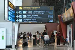 Passengers at Jakarta's international airport. A recent ransomware attack caused widespread disruption and data loss in immigration offices, affecting airport operations and the passport verification system.