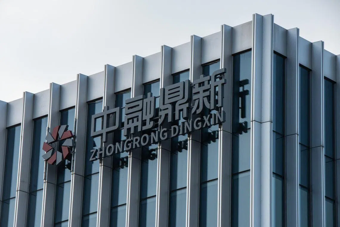 The Zhongrong International Trust offices in Beijing, Aug 14, 2023. China's banking regulator has set up a taskforce to examine risks at Zhongzhi Enterprise Group, one of the nation's top private wealth managers, after its unit Zhongrong missed payments on multiple high-yield investment products. 