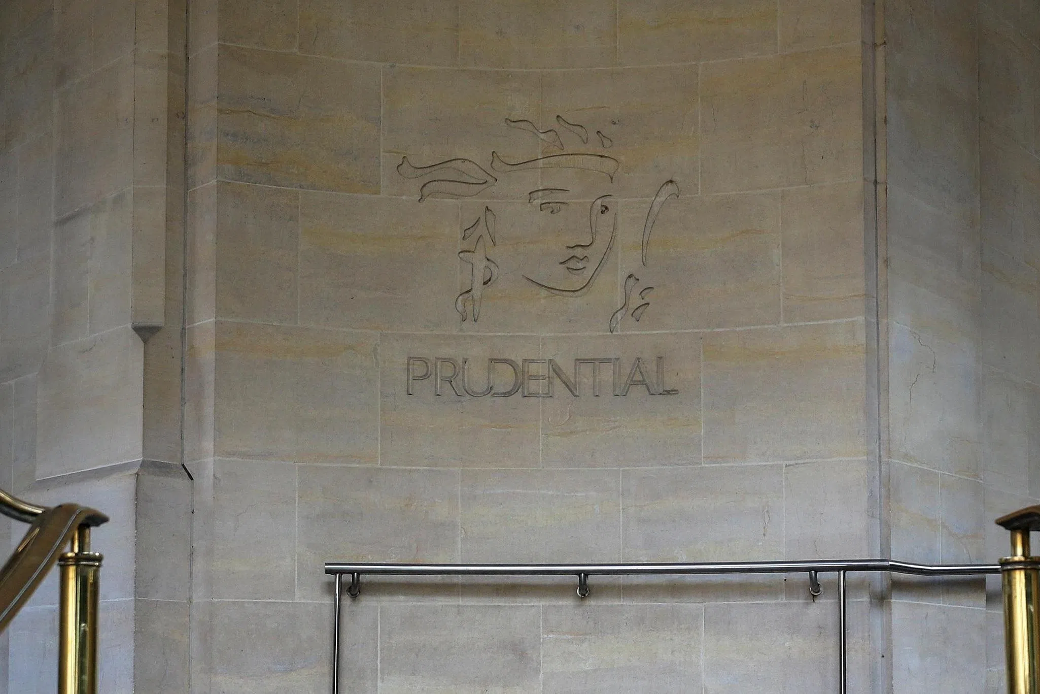 Prudential posts 12% rise in new business profit, flags US$7
