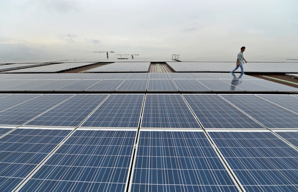 Solar panels on a factory roof in Singapore. Governments can encourage such investments through tax rebates, subsidies, grants – and clear sustainability roadmaps.