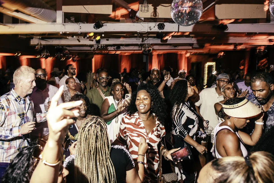 Attendees dance at an after-party during the 22nd annual Martha's Vineyard African American Film Festival, a nine-day event devoted to celebrating Black filmmakers.