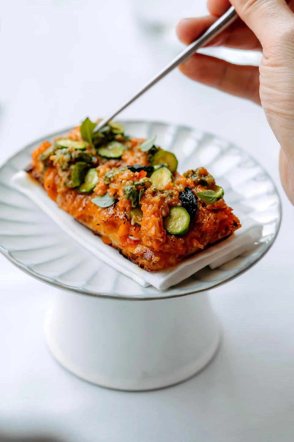 The Pizzette Chilli King Crab features spicy chilli crab on crunchy focaccia bread.