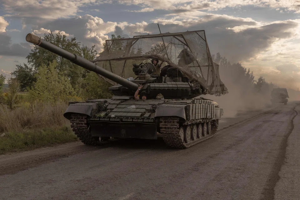 Ukrainian servicemen drive Soviet-made T-64 tanks in the Sumy region, near the border with Russia, Aug 11, 2024.