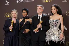 Sara Murphy, Teyana Taylor, Paul Thomas Anderson and Chase Infiniti pose with the Best Motion Picture - Musical or Comedy award for 'One Battle After Another' at the 83rd Annual Golden Globes.